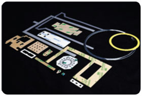 Custom die cut gasket and insulator